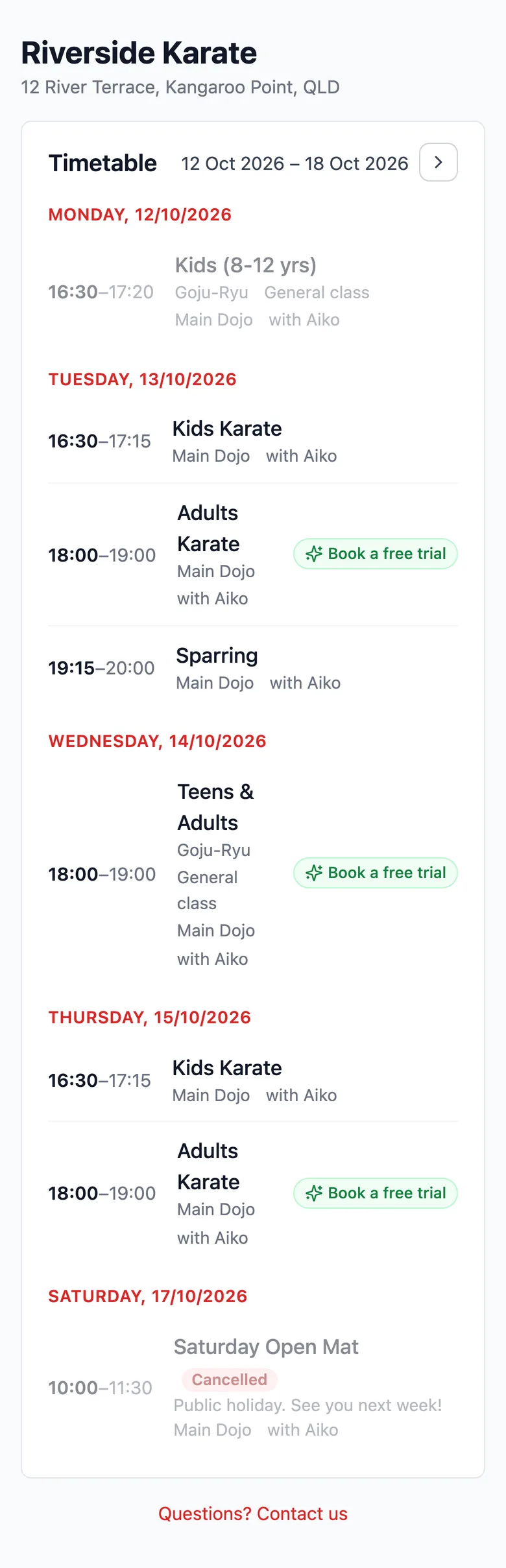 The dojo's public timetable on a phone, with the Saturday Open Mat marked Cancelled and the reason underneath.