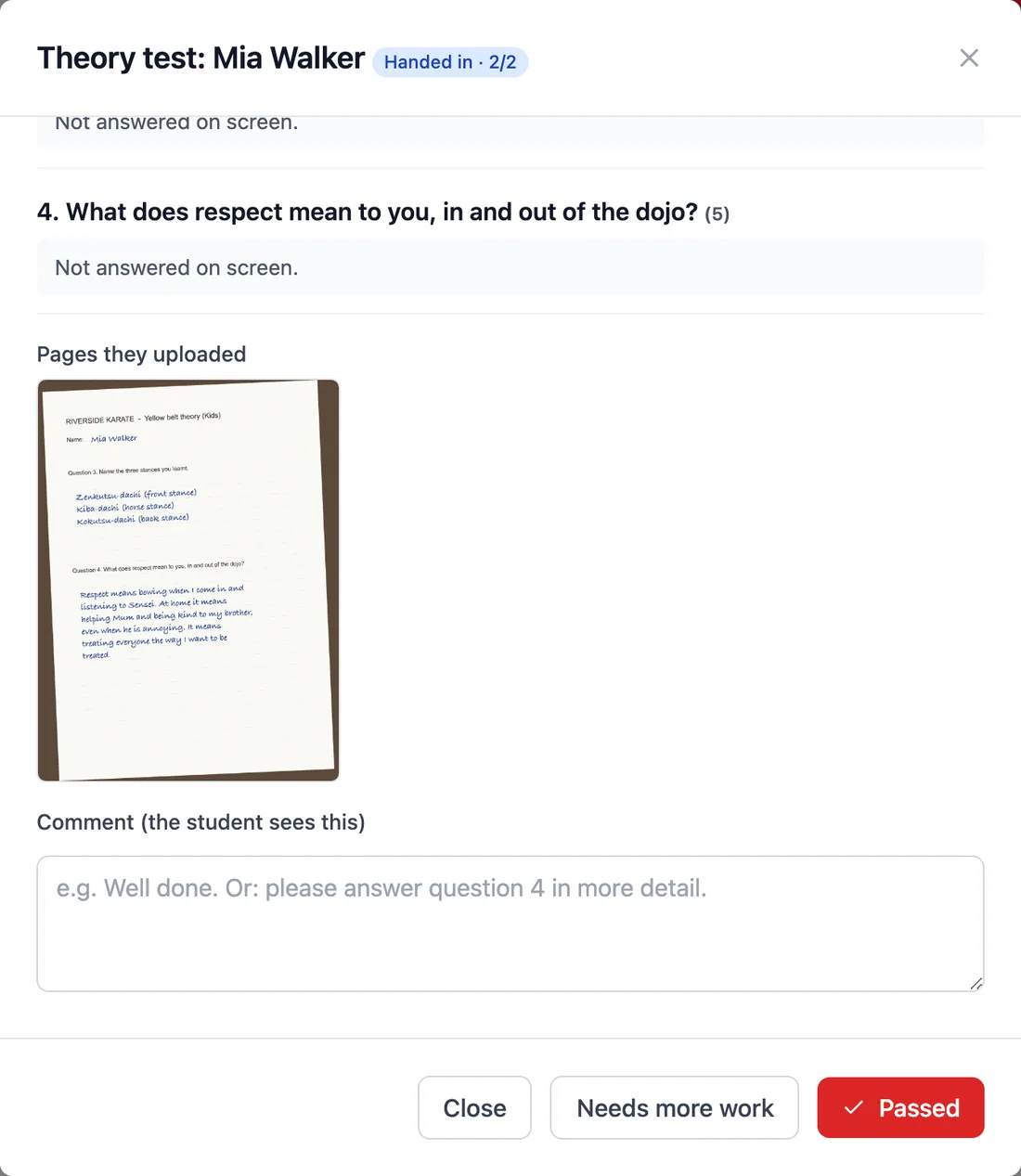 The uploaded photo of a handwritten answer page, shown in the review, with a comment box for the student.